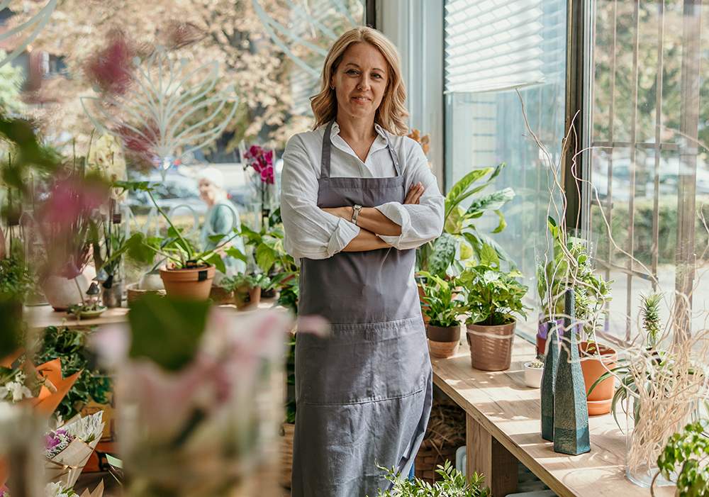 women standing in her florist shop